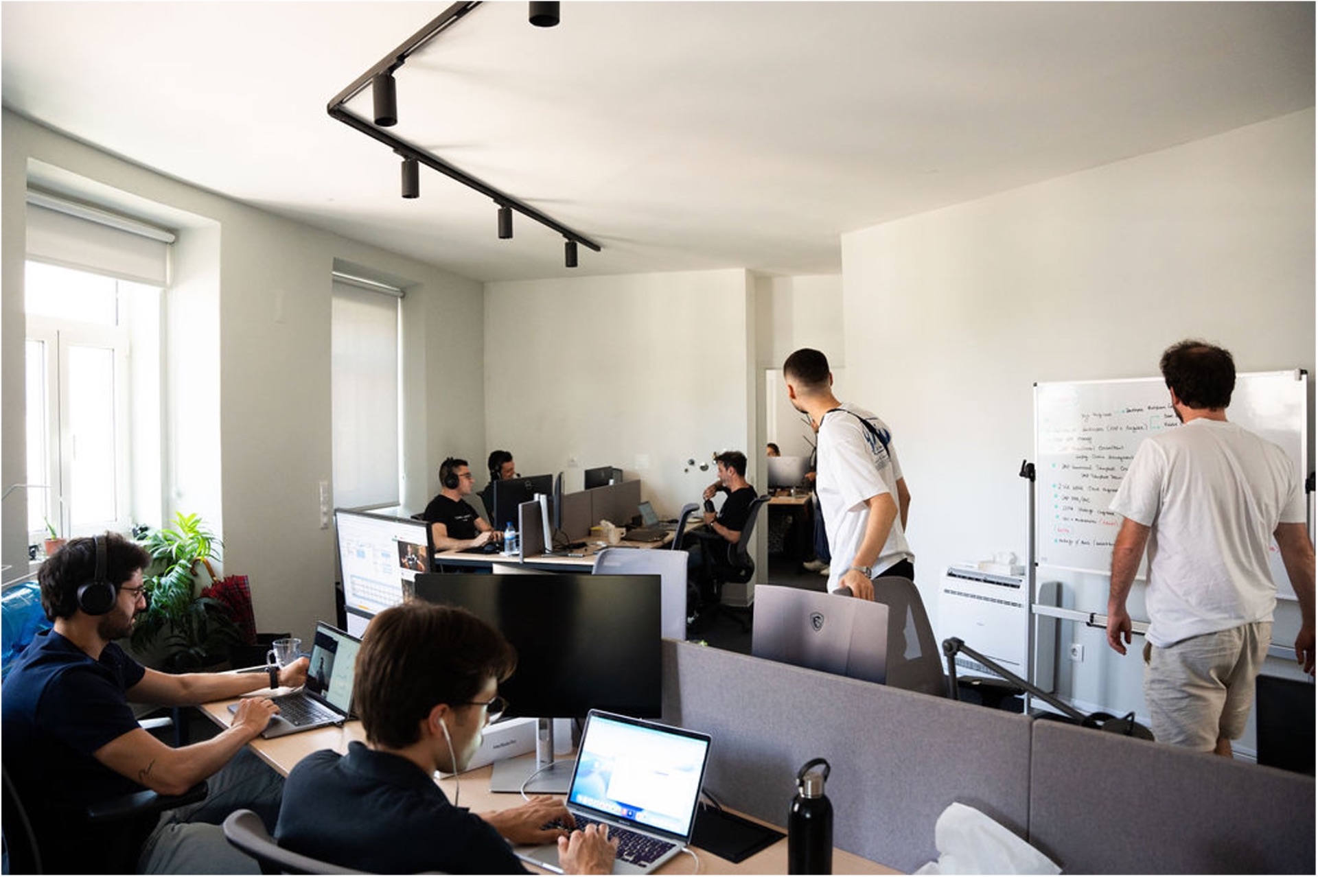 Velv nearshore team collaborating in the office